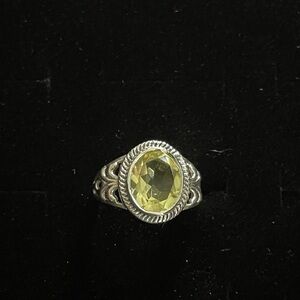 Elegant Silver Ring with Yellow Gemstone